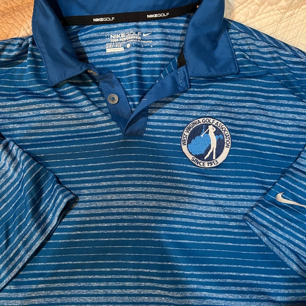 Nike Men's Blue Striped Polo Shirt